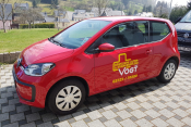 VW Up! von Vogt Pflegedienst beschriftet